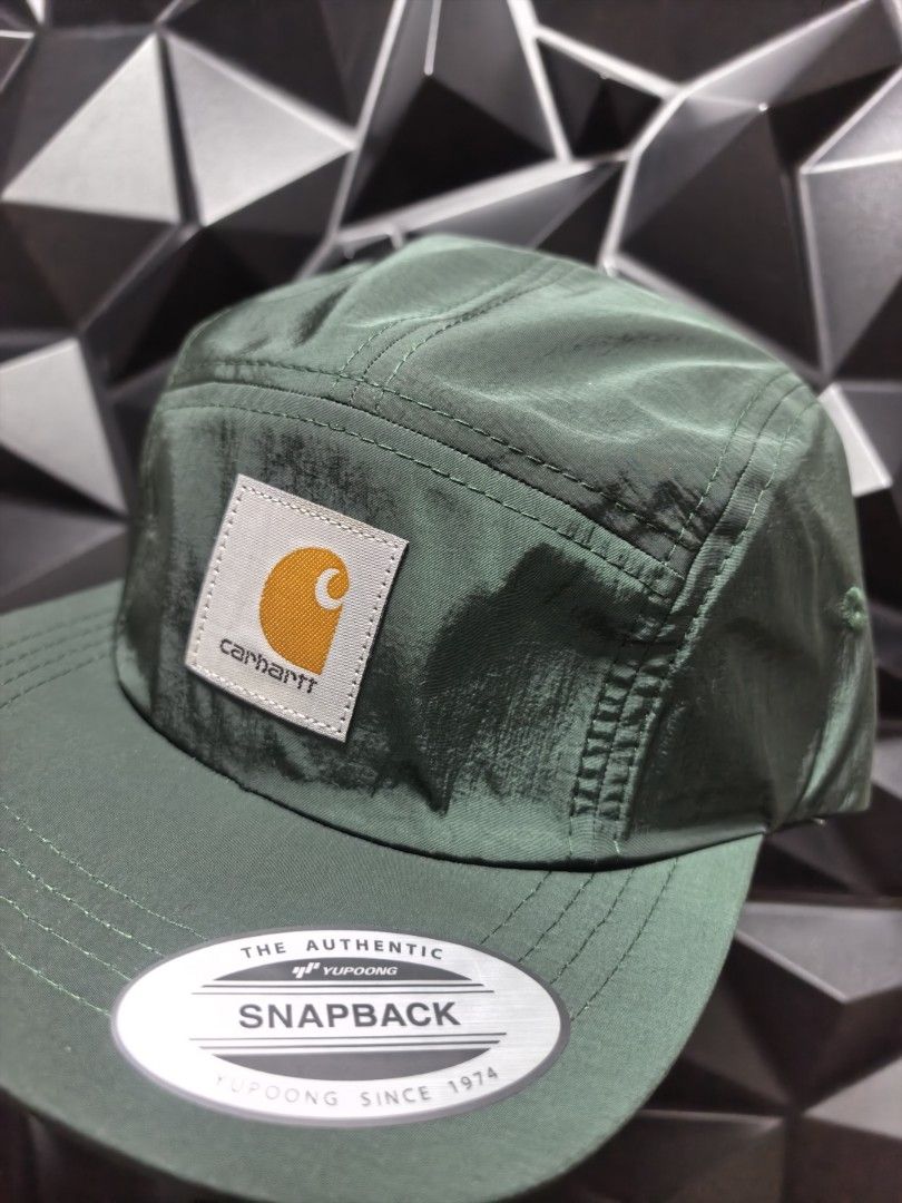 Carhartt Snapback Cap (Category: Caps & Hats) located in Bacoor. Submitted by secretsup (Listing ID 1424456001, Image 2). Description: - Carhartt snapback cap - Classic five-panel design - Flat brim - Adjustable strap for a comfortable fit - Carhartt logo on the front - Lightweight material - Available colors: Green, Blue.