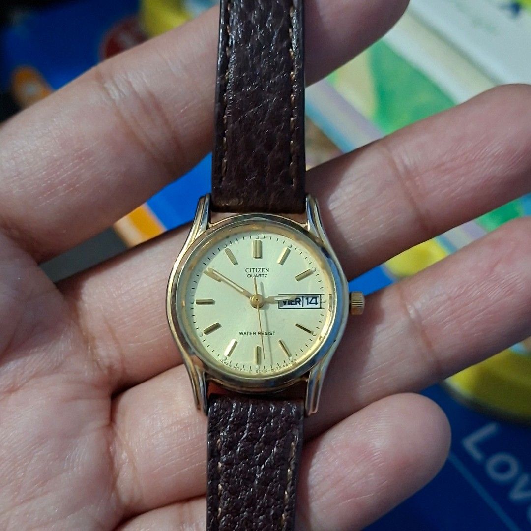 Citizen Quartz Watch with Brown Leather Strap (Category: Women's Watches) located in Cavite. Submitted by sofabinpink (Listing ID 1424423373, Image 1). Description: Replaced Strap - Citizen quartz watch - Gold-toned face and case - Brown leather strap - Displays day and date - Classic design.