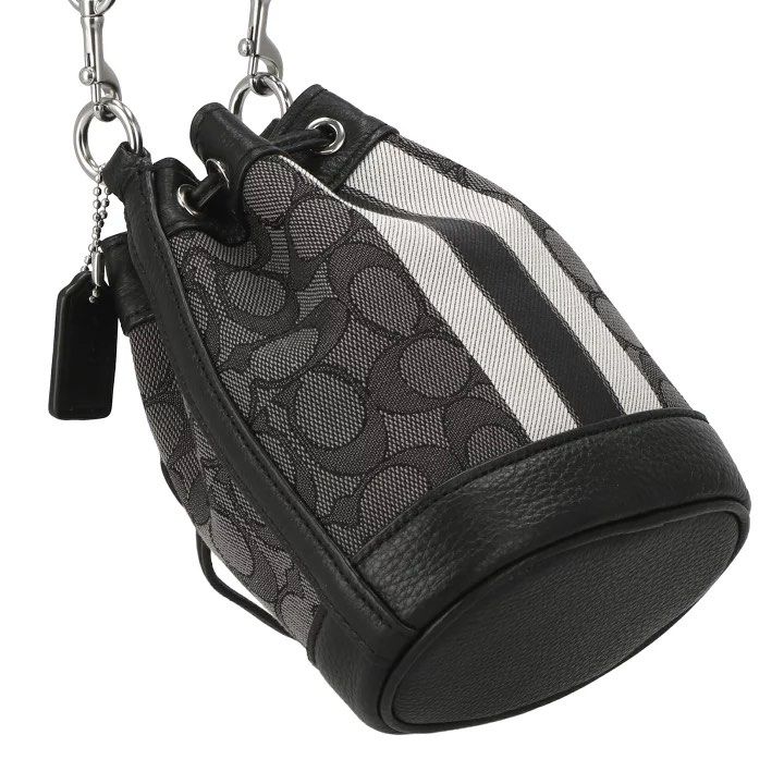 Coach Mini Dempsey Bucket Bag (Category: Luxury Bags & Wallets) located in Santa Rosa. Submitted by miqboutique (Listing ID 1424432459, Image 3). Description: Coach Mini Dempsey Bucket Bag ₱5,499 + SF • Ready to ship • Guaranteed Original Fb page: Miq's Boutique.