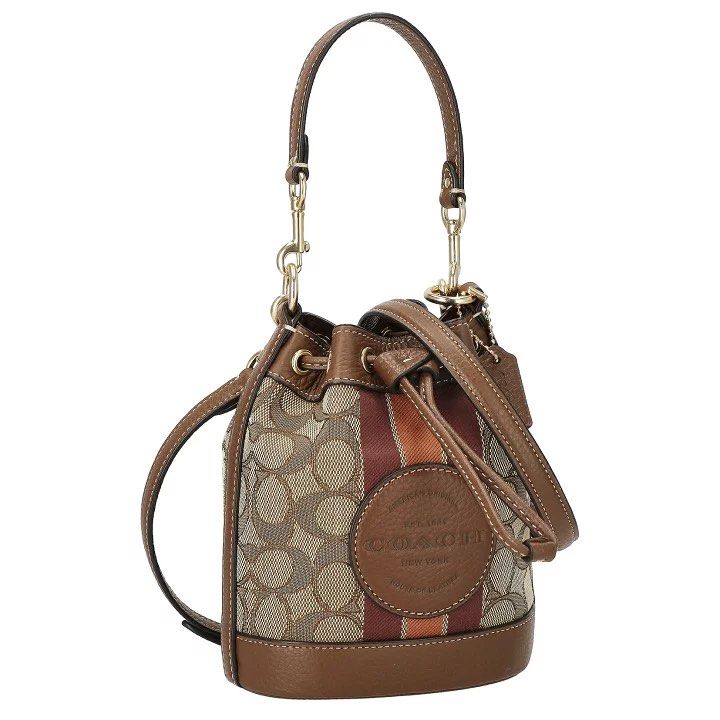 Coach Mini Dempsey Bucket Bag (Category: Luxury Bags & Wallets) located in Santa Rosa. Submitted by miqboutique (Listing ID 1424432459, Image 2). Description: Coach Mini Dempsey Bucket Bag ₱5,499 + SF • Ready to ship • Guaranteed Original Fb page: Miq's Boutique.