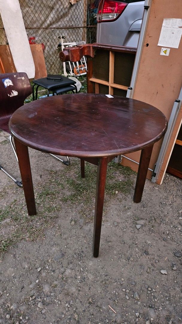 COFFEE TABLE (Category: Tables & Sets) located in Makati City. Submitted by hum_free2000 (Listing ID 1424513837, Image 3). Description: - Round coffee table - Dark wood finish - Classic design - Ideal for living rooms, patios, etc. .