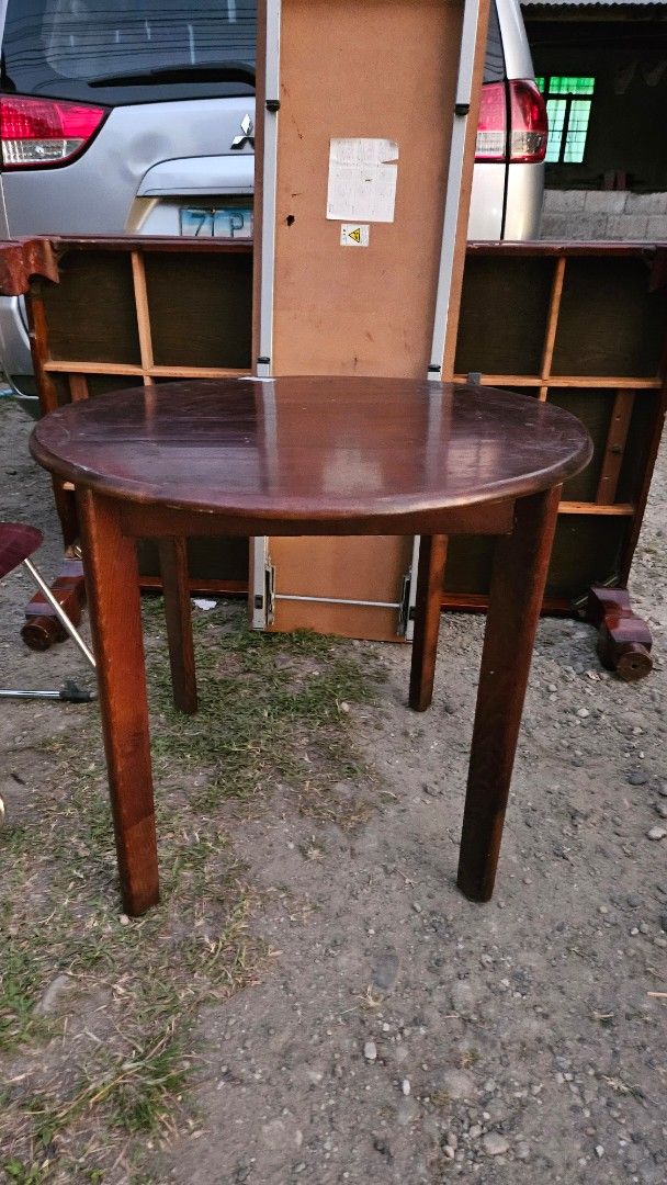 COFFEE TABLE (Category: Tables & Sets) located in Makati City. Submitted by hum_free2000 (Listing ID 1424513837, Image 2). Description: - Round coffee table - Dark wood finish - Classic design - Ideal for living rooms, patios, etc. .