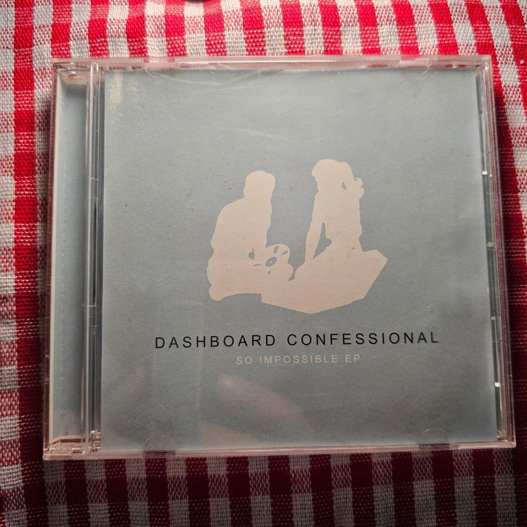 Dashboard Confessional - So Impossible EP - CD NM (Category: CDs & DVDs) located in Quezon City. Submitted by serefrenpaz (Listing ID 1424487014, Image 1). Description: Dashboard Confessional's "So Impossible" EP CD. Includes tracks like "For You to Notice", "So Impossible", "Remember to Breathe", and "Hands Down". The CD is in its original jewel case. Made in the USA. Produced by James Paul Wisner. Released in 2001..
