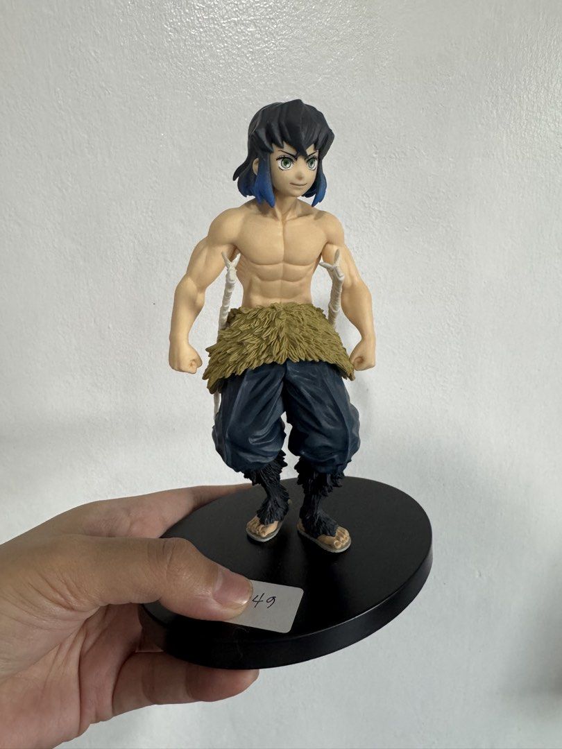 Demon Slayer Inosuke Hashibira Figure (Category: Figurines & Statues) located in Santa Ana. Submitted by tokiotokio (Listing ID 1424433361, Image 1). Description: - Inosuke Hashibira figure from Demon Slayer. - Features a dynamic pose. - Showcases his muscular physique and boar head. - Includes a black circular base. - Detailed with accurate colors and design. - A great addition to any anime collection. -No box, loose.