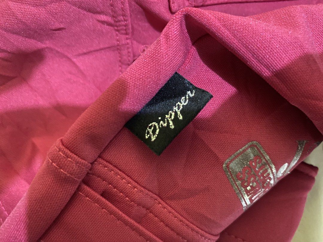 Dipper Pink Shorts with Rhinestones (Category: Shorts) located in Ozamiz City. Submitted by sw4gcvnt (Listing ID 1424458480, Image 2). Description: Stylish pink shorts from Dipper. Features rhinestone embellishments, including a skull design on the front pocket and "OK" on the back. Detailed with silver studs and decorative text. Includes a belt-like design at the waist. Perfect for a bold and unique look. SIZE 29-31.