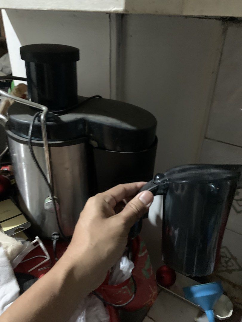 Electric Juicer 3D (Category: Juicers, Blenders & Grinders) located in Paranaque City. Submitted by showboat (Listing ID 1424518741, Image 2). Description: - Stainless steel body - Black top - Includes black juice container - In good working condition - Ideal for making fresh fruit and vegetable juices.