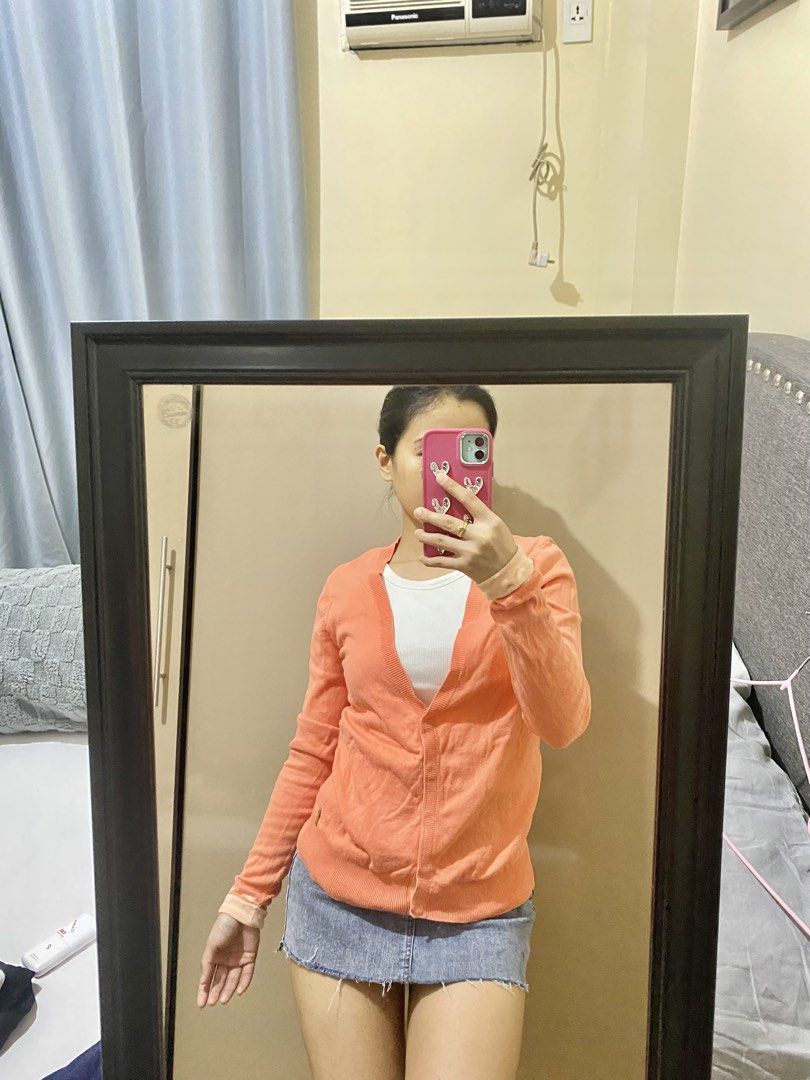 Esprit Peach Cardigan (Category: Coats, Jackets and Outerwear) located in Taguig. Submitted by jaebae_ (Listing ID 1424325167, Image 3). Description: - Esprit cardigan - Peach color - V-neck design - can fit to S-M - Long sleeves with folded cuffs - Gold Button closures - Striped interior lining - Brand tag visible.