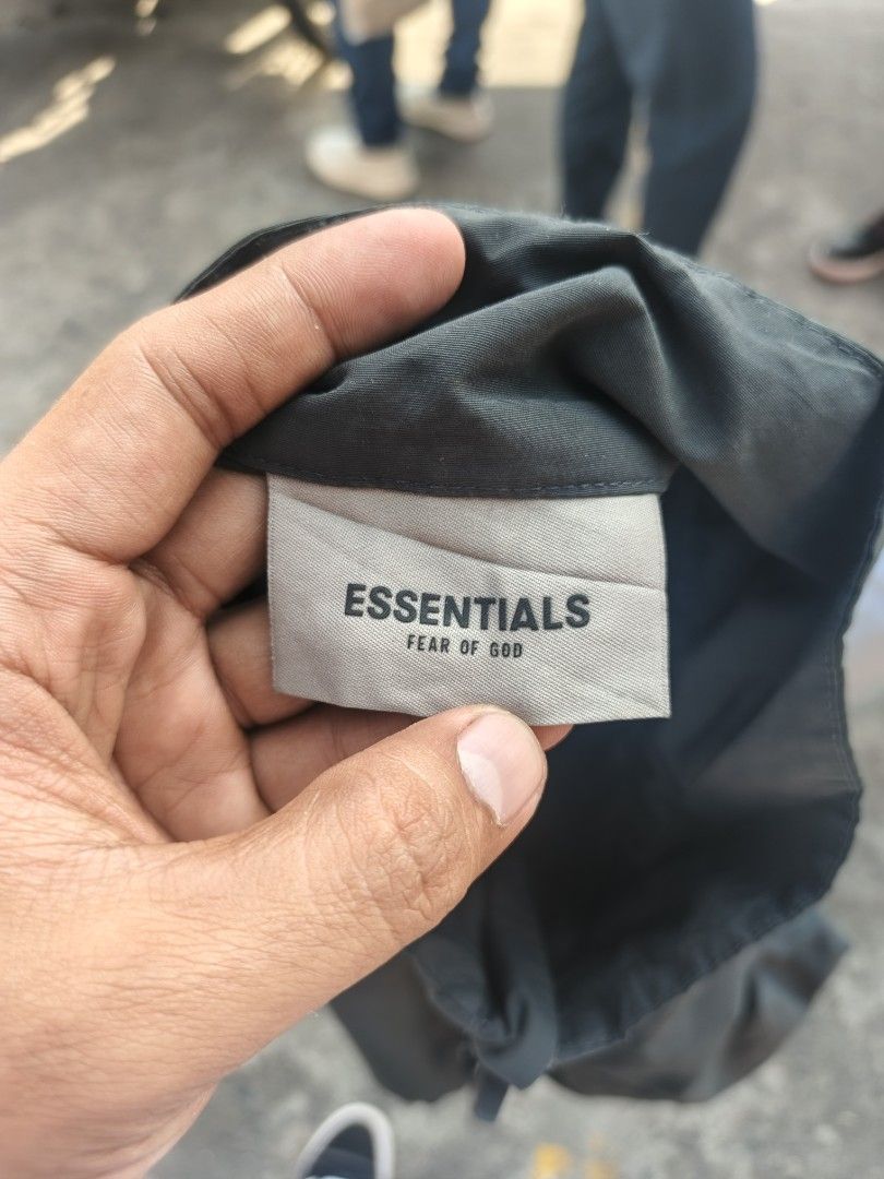 ESSENTIALS HALF ZIP TRACK JACKET (Category: Luxury Apparel) located in Mabalacat. Submitted by thriftThings (Listing ID 1424365858, Image 2). Description: ESSENTIALS HALF ZIP TRACK JACKET Size: SMALL Fit Large Boxy Excellent Condition Sign og Usage sa metal.