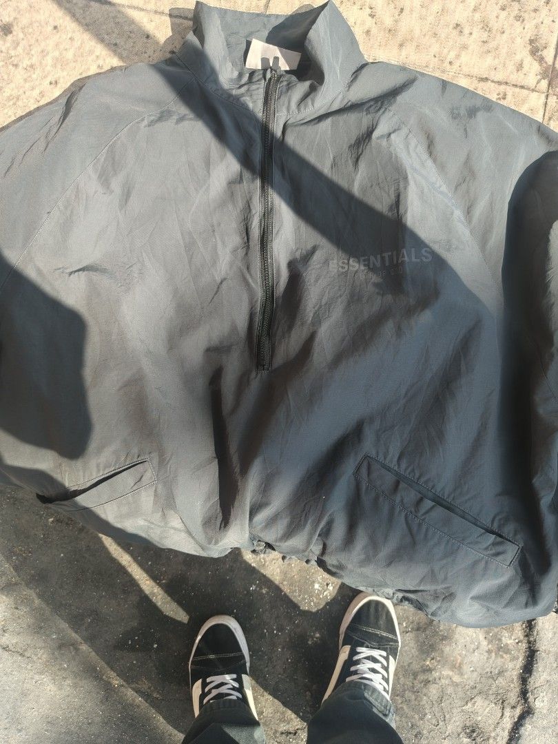 ESSENTIALS HALF ZIP TRACK JACKET (Category: Luxury Apparel) located in Mabalacat. Submitted by thriftThings (Listing ID 1424365858, Image 1). Description: ESSENTIALS HALF ZIP TRACK JACKET Size: SMALL Fit Large Boxy Excellent Condition Sign og Usage sa metal.