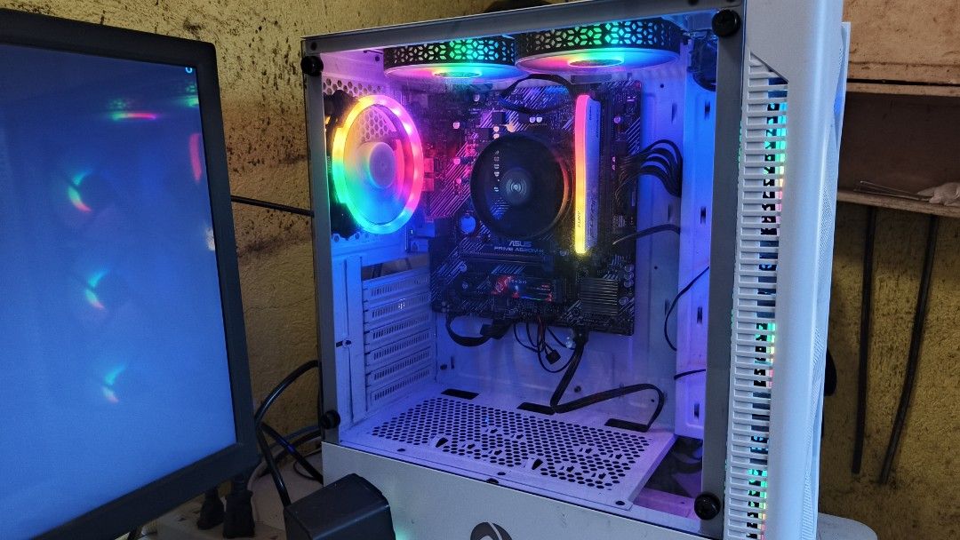 Gaming PC with RGB Lights (Category: Desktops) located in Bay. Submitted by peterrss (Listing ID 1424412173, Image 2). Description: ‎🖥 SYSTEM UNIT SPECS: ‎✅ CASE: Inplay ATX Case ‎✅ MOBO: ASUS PRIME A520M-K ‎✅ PROCESSOR: AMD Ryzen 5 4600G (6 Cores / 12 Threads) ‎✅ GRAPHICS: Radeon Vega Integrated Graphics ‎✅ RAM: 8GB DDR4 ‎✅ STORAGE: ‎• 128GB SSD (OS & apps – mabilis) ‎• 500GB HDD (files & games) ‎🖥 MONITOR: ‎✅ 24” Supervision Monitor ‎✅ 75Hz R