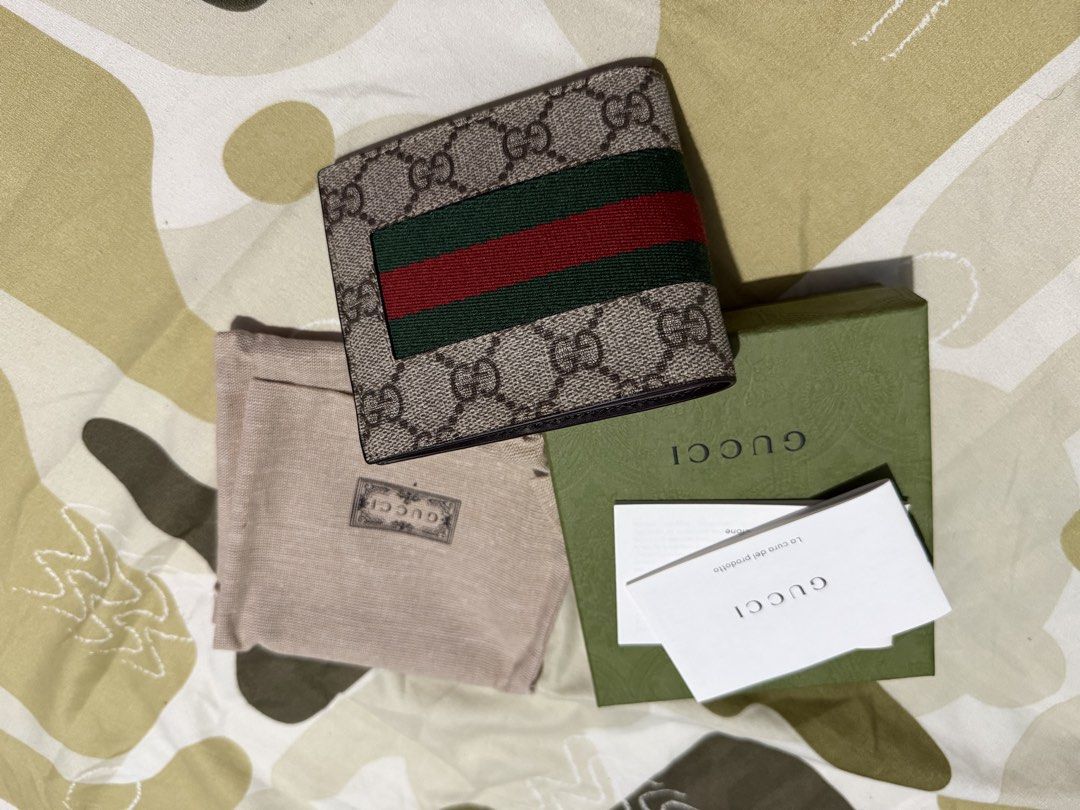 Gucci GG Supreme Wallet (Category: Luxury Bags & Wallets) located in Makati City. Submitted by echotuscano (Listing ID 1424509922, Image 2). Description: Selling Gucci Bifold wallet Bought in Japan last yesr Never Used.