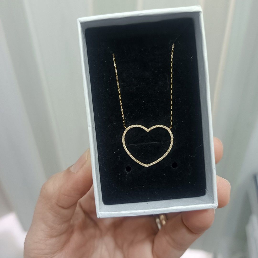 Heart Pendant Necklace (Category: Necklaces) located in Dagupan City. Submitted by nmcmp4 (Listing ID 1424483744, Image 2). Description: - Gold heart pendant necklace - Features small stone detailing - Comes with a protective box - Perfect gift for any occasion - 💎Open Heart Diamond necklace✨ . 250 carat natural diamonds Top SI clarity GH color 18k Japan yellow gold setting 18 inches adjustable 3 months lay away payment mode - with certificate.