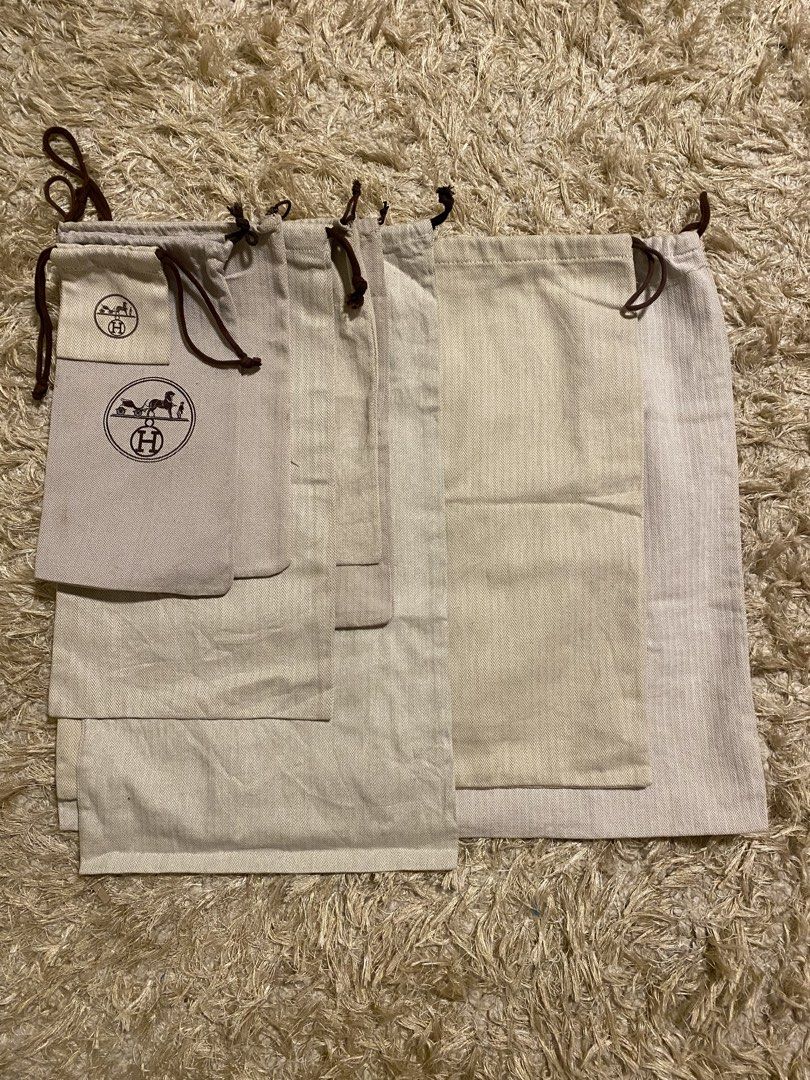 Hermes Dust Bags (Category: Luxury Bags & Wallets) located in Manila. Submitted by avathriftedcloset (Listing ID 1424470720, Image 1). Description: Set of authentic Hermes dust bags in various sizes. Features the Hermes logo. Includes multiple bags, suitable for storing and protecting luxury items. Made of a light beige fabric with drawstring closures. Perfect for organizing and preserving your Hermes collection. 300-1500 each, depends on its siz