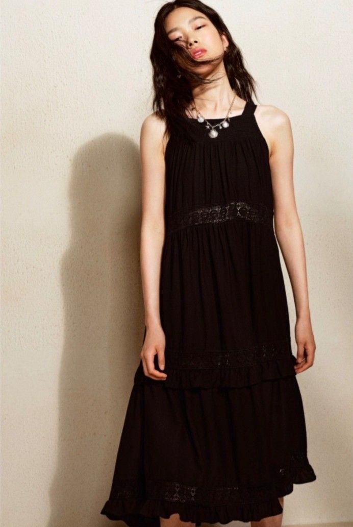 H&M Black Halter Dress (Category: Dresses) located in Quezon City. Submitted by miss.len (Listing ID 1424491567, Image 1). Description: - H&M black halter dress - Size: M - Features: - Tiered design - Lace detailing - Keyhole back - Midi length - Perfect for casual or dressy wear - Comfortable, lightweight fabric.
