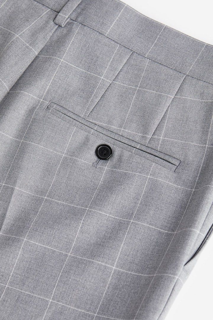 H&M Slim Fit Checkered Trousers (Category: Trousers) located in Baguio. Submitted by themimosa2600 (Listing ID 1424473404, Image 2). Description: Stylish H&M slim fit trousers in a gray checkered pattern. Features a classic design with a buttoned back pocket and a zip fly with a button closure. The trousers have a size 31 waist. Perfect for both casual and semi-formal occasions. Made from a comfortable fabric, these trousers offer a modern fit..
