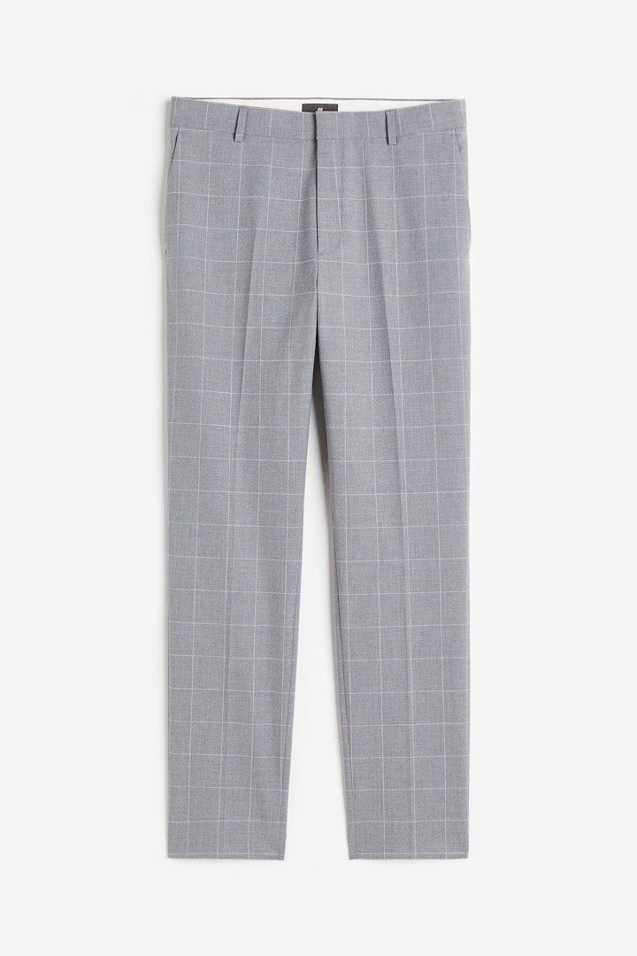 H&M Slim Fit Checkered Trousers (Category: Trousers) located in Baguio. Submitted by themimosa2600 (Listing ID 1424473404, Image 1). Description: Stylish H&M slim fit trousers in a gray checkered pattern. Features a classic design with a buttoned back pocket and a zip fly with a button closure. The trousers have a size 31 waist. Perfect for both casual and semi-formal occasions. Made from a comfortable fabric, these trousers offer a modern fit..