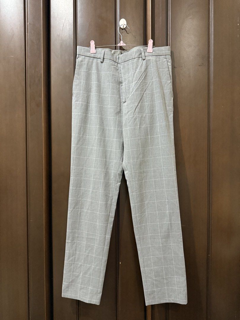 H&M Slim Fit Checkered Trousers (Category: Trousers) located in Baguio. Submitted by themimosa2600 (Listing ID 1424473404, Image 3). Description: Stylish H&M slim fit trousers in a gray checkered pattern. Features a classic design with a buttoned back pocket and a zip fly with a button closure. The trousers have a size 31 waist. Perfect for both casual and semi-formal occasions. Made from a comfortable fabric, these trousers offer a modern fit..