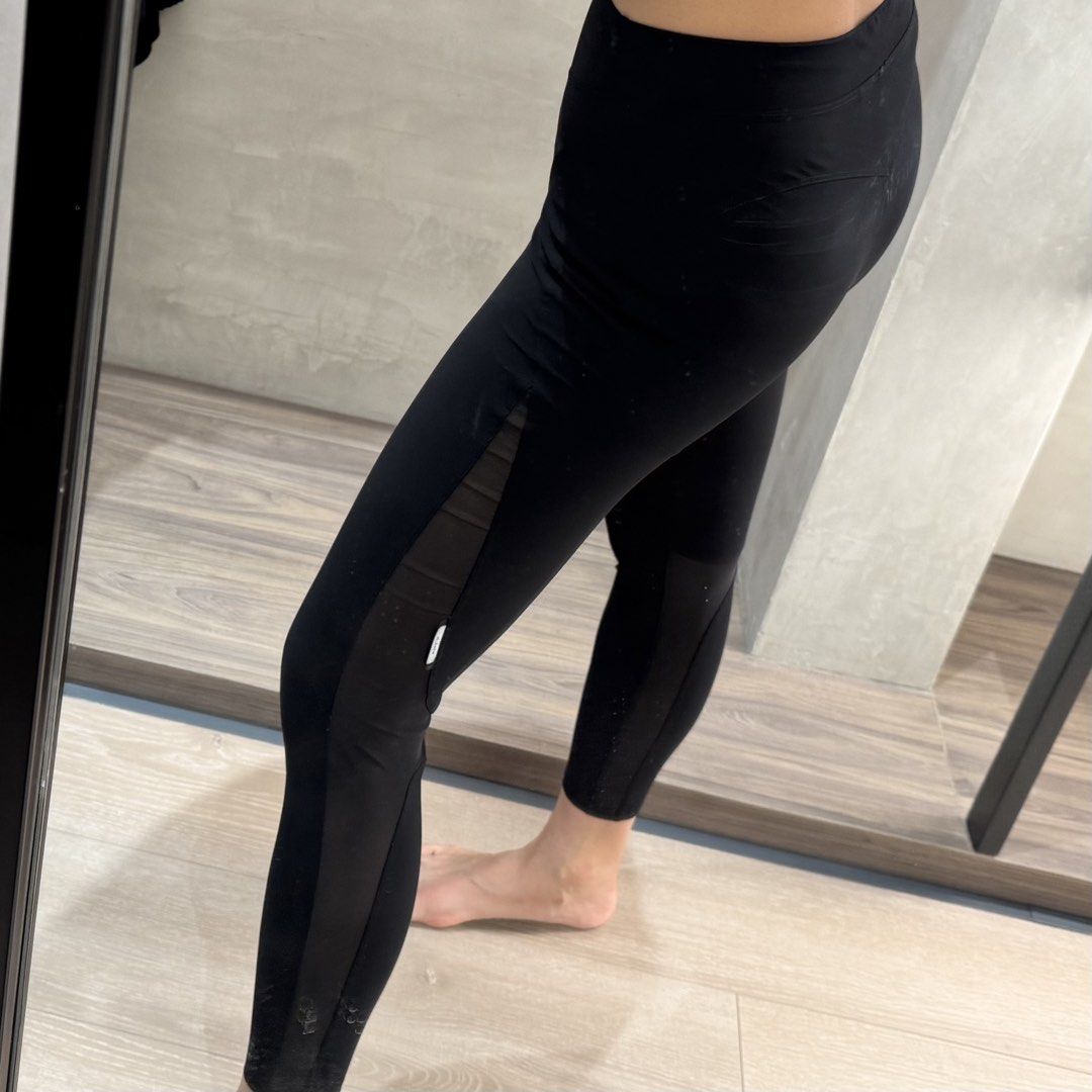 Jelenew Black Leggings (Category: Activewear) located in San Juan City. Submitted by steffchua (Listing ID 1424366190, Image 2). Description: - Black leggings with mesh side panels. - High-waisted design. - Unique seam pattern. - Brand label visible. - Made from stretchy, athletic fabric. - Ideal for workouts and casual outfits. - Used only once.