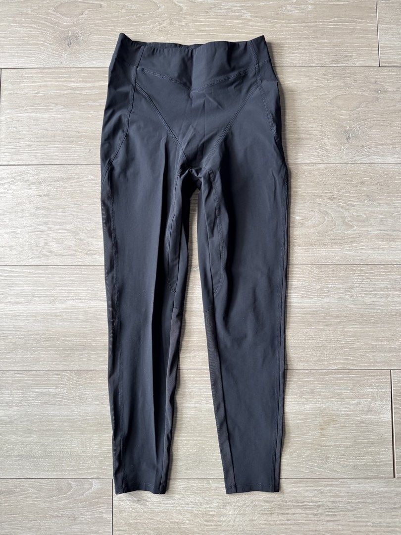 Jelenew Black Leggings (Category: Activewear) located in San Juan City. Submitted by steffchua (Listing ID 1424366190, Image 3). Description: - Black leggings with mesh side panels. - High-waisted design. - Unique seam pattern. - Brand label visible. - Made from stretchy, athletic fabric. - Ideal for workouts and casual outfits. - Used only once.
