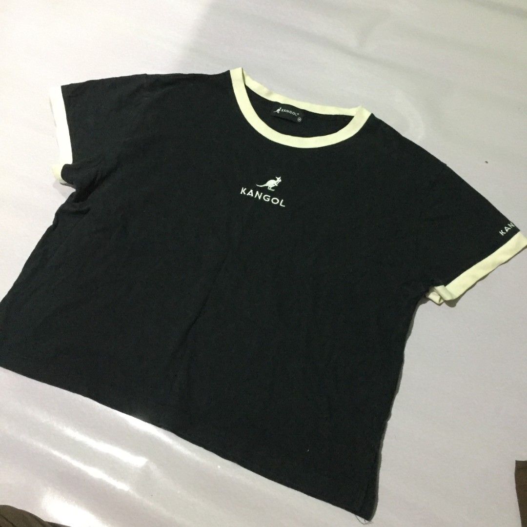 Kangol crop shirt (Category: Tshirts & Polo Shirts ) located in Lucena. Submitted by brkrobert (Listing ID 1424423027, Image 1). Description: - Black Kangol t-shirt - White trim on collar and sleeves - Embroidered Kangol logo on chest and sleeve - Crew neck - Size: Medium -needs wash minimal yellowing sa white rings 22x20.