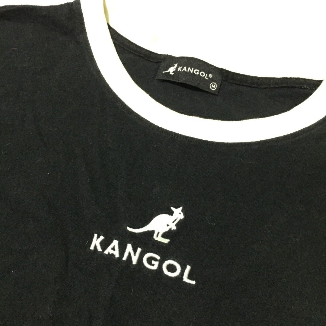 Kangol crop shirt (Category: Tshirts & Polo Shirts ) located in Lucena. Submitted by brkrobert (Listing ID 1424423027, Image 2). Description: - Black Kangol t-shirt - White trim on collar and sleeves - Embroidered Kangol logo on chest and sleeve - Crew neck - Size: Medium -needs wash minimal yellowing sa white rings 22x20.