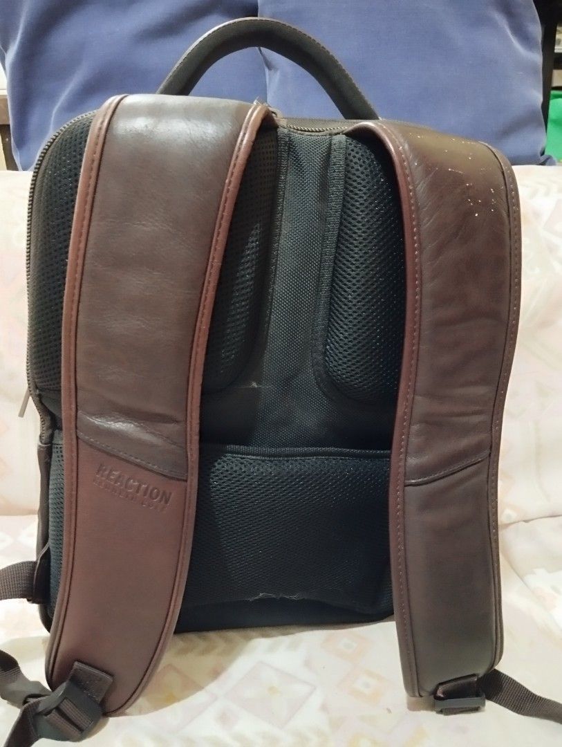 Kenneth Cole Reaction Leather Backpack (Category: Luxury Bags & Wallets) located in Caloocan City. Submitted by janneagustin (Listing ID 1424367614, Image 3). Description: - Kenneth Cole Reaction backpack - Genuine Leather - Multiple zippered compartments - Top handle for easy carrying - Adjustable shoulder straps for comfort - Front pocket with brand logo - Spacious interior, ideal for daily use or travel - guaranteed original .