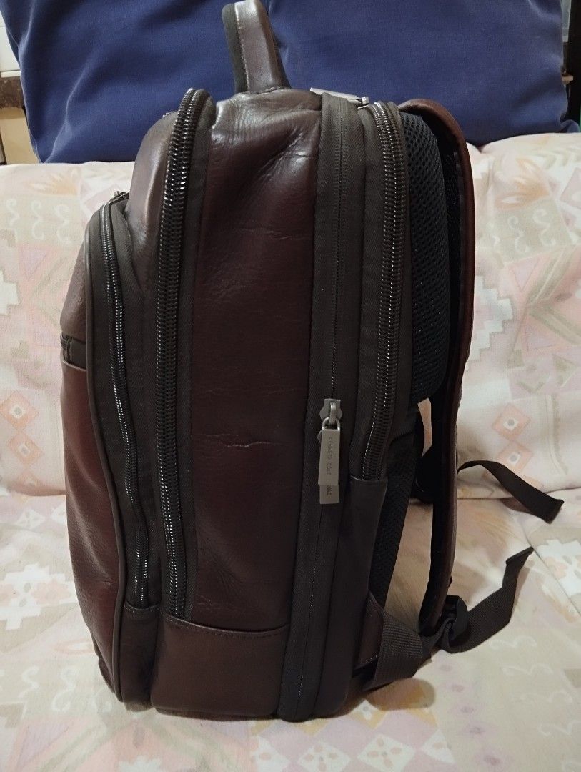Kenneth Cole Reaction Leather Backpack (Category: Luxury Bags & Wallets) located in Caloocan City. Submitted by janneagustin (Listing ID 1424367614, Image 2). Description: - Kenneth Cole Reaction backpack - Genuine Leather - Multiple zippered compartments - Top handle for easy carrying - Adjustable shoulder straps for comfort - Front pocket with brand logo - Spacious interior, ideal for daily use or travel - guaranteed original .