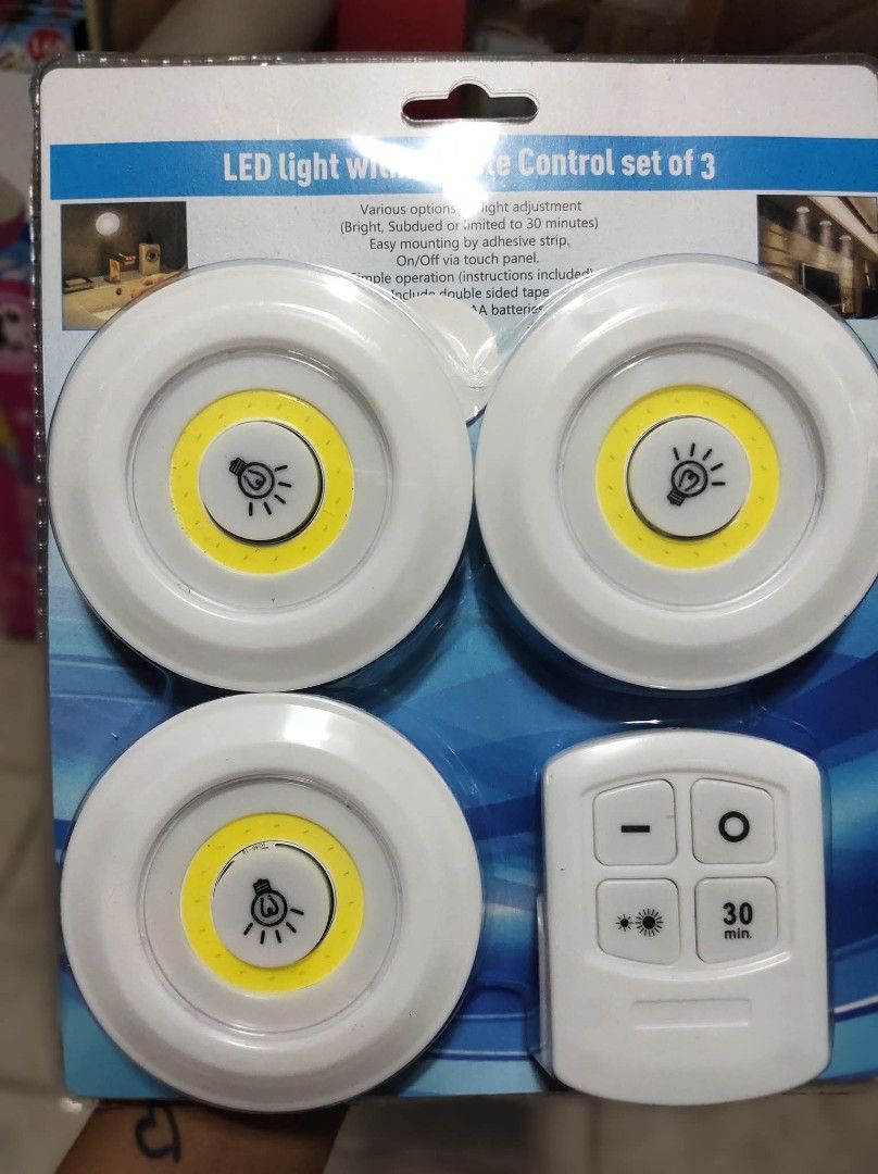 LED Light with Remote Control Set of 3 (Category: Lighting) located in Manila. Submitted by yzlshop (Listing ID 1424345982, Image 1). Description: Set includes three LED lights and a remote control. Features include various brightness adjustments, the lights can be dimmed or set to 30 minutes, and easy mounting with adhesive strips. The lights can be turned on/off via the touch panel. Includes double-sided tape and batteries..