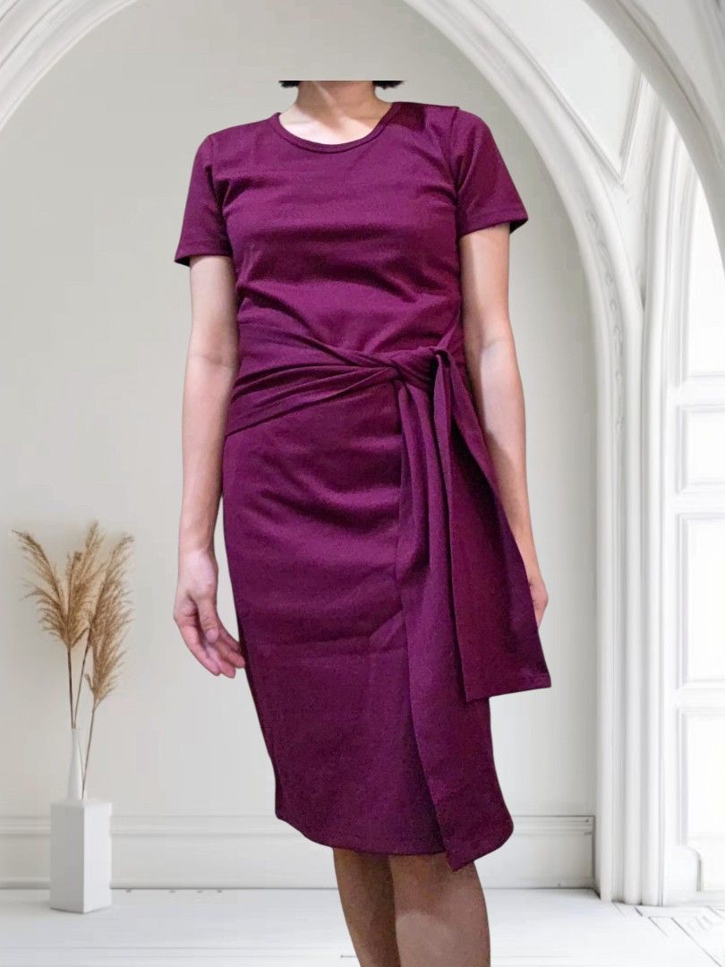 Maroon Dress with Wrap Ribbon (Category: Dresses) located in Quezon City. Submitted by highonspotlight (Listing ID 1424509117, Image 1). Description: - Maroon wrap dress - Round neckline - Short sleeves - Wrap design with tie closure - Solid, non-textured fabric fits XS to S frame.