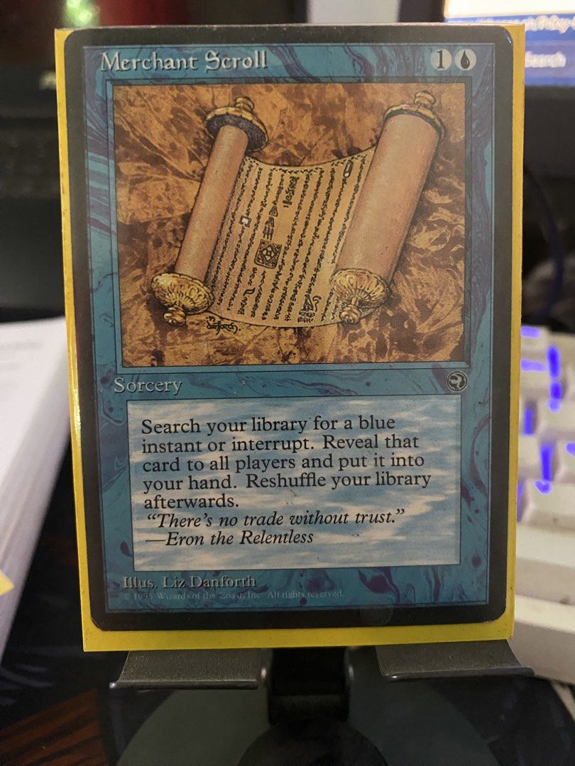 Merchant Scroll Magic The Gathering Card (Category: Raw Singles) located in Candon. Submitted by sycronized016 (Listing ID 1424368743, Image 1). Description: - Merchant Scroll card from Magic: The Gathering - Color: Blue - Type: Sorcery - Card Text: Search your library for a blue instant or interrupt, reveal it, and put it into your hand. Reshuffle your library. - Artist: Liz Danforth.