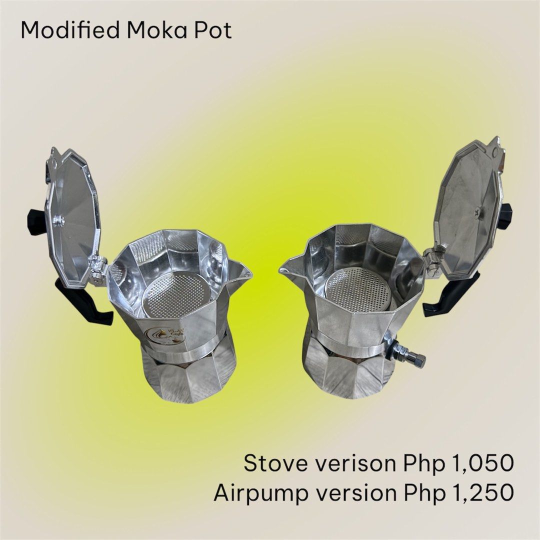 Modified Moka Pot - Stove and Airpump Versions (Category: Coffee Machines & Makers) located in Quezon City. Submitted by clytheev (Listing ID 1424430560, Image 1). Description: - Modified Moka Pot available - Two versions: - Stove version: Php 1,050 - Airpump version: Php 1,250 - Silver-colored metal - Black handles - Open lid design Pickup amaia skies cubao/ edsa shangrila.