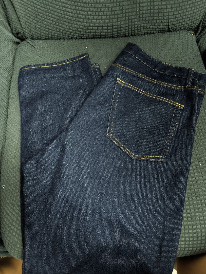 Muji Raw/indigo denim (Category: Jeans) located in Makati City. Submitted by madvillainkicks (Listing ID 1424517077, Image 3). Description: Classic dark wash denim jeans with a straight leg and button fly. Features a five-pocket design and yellow stitching. Medium weight denim..