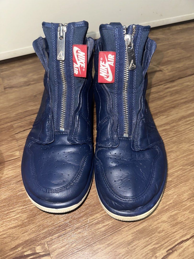 Nike Air Jordan 1 High Zip 'Navy' (Category: Sneakers) located in San Pablo. Submitted by crazyr17 (Listing ID 1424435605, Image 1). Description: Air Jordan 1 High Zip in navy blue. Features a zipper closure and the iconic Nike Air tag. The shoes have a white sole and the Air Jordan logo on the side. Size US 7, UK 4.5, EUR 38, CM 24. Model number AQ3742-401. Made in China. Repainted .