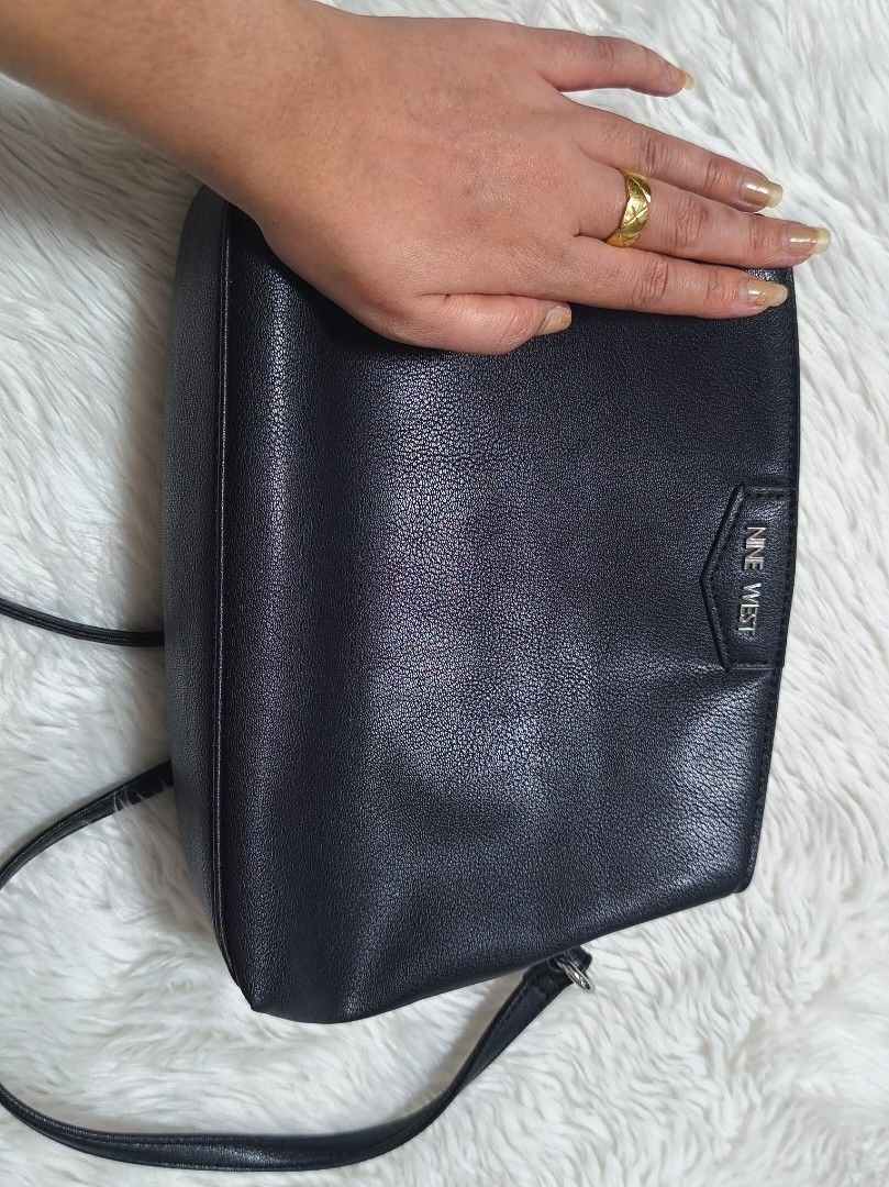 Nine West Black Crossbody Bag (Category: Cross-body Bags) located in Mandaluyong City. Submitted by bisou_ph2 (Listing ID 1424472253, Image 3). Description: Nine West crossbody bag from Canada Never been used open for pick up, shipping or lalamove. Location: Mandaluyong City.