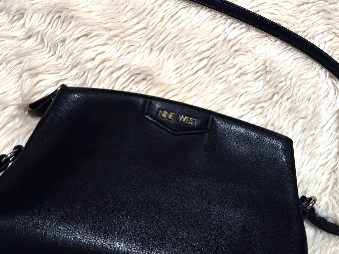 Nine West Black Crossbody Bag (Category: Cross-body Bags) located in Mandaluyong City. Submitted by bisou_ph2 (Listing ID 1424472253, Image 2). Description: Nine West crossbody bag from Canada Never been used open for pick up, shipping or lalamove. Location: Mandaluyong City.