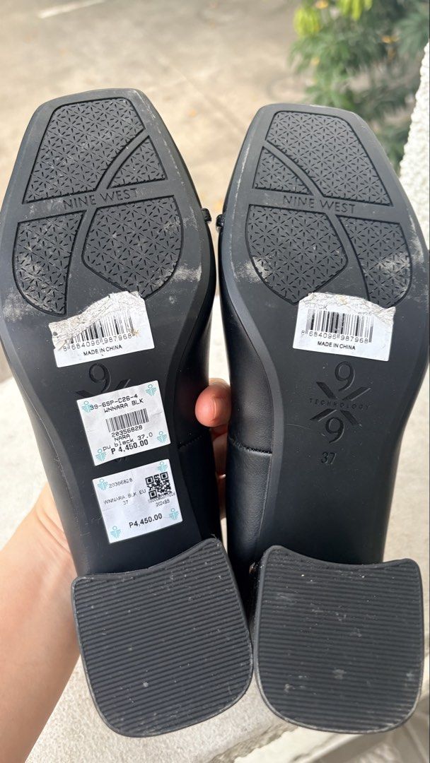 Nine West Nara Pumps EU37/US6.5 (Category: Heels) located in Pasig City. Submitted by bituin18 (Listing ID 1424519800, Image 3). Description: Nine West Nara pumps in black. Features a square toe design with a gold chain detail on the front. The heels have a gold trim. The soles show the Nine West logo and size 37. The original price tag is still attached. The shoes have some signs of wear on the insole and the exterior. Used 1x. Rfs: wrong size f