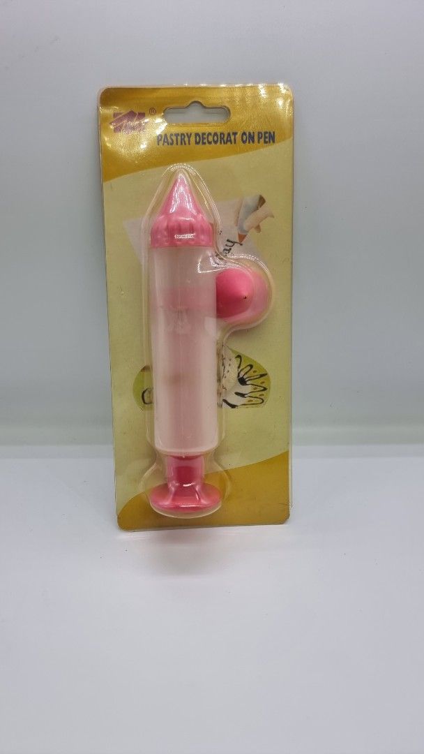 Pastry Decorator On Pen (Category: Bakeware) located in Marikina City. Submitted by andreah_16 (Listing ID 1424358836, Image 2). Description: - New pastry decorating pen. - Color: Pink and white. - Comes in original packaging. - Specifically designed for pastry decoration. - Packaging reads: "Pastry Decorat On Pen"..