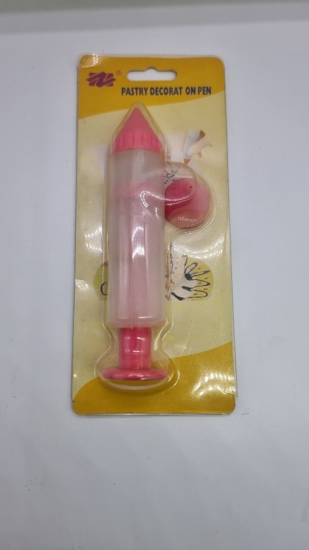 Pastry Decorator On Pen (Category: Bakeware) located in Marikina City. Submitted by andreah_16 (Listing ID 1424358836, Image 3). Description: - New pastry decorating pen. - Color: Pink and white. - Comes in original packaging. - Specifically designed for pastry decoration. - Packaging reads: "Pastry Decorat On Pen"..