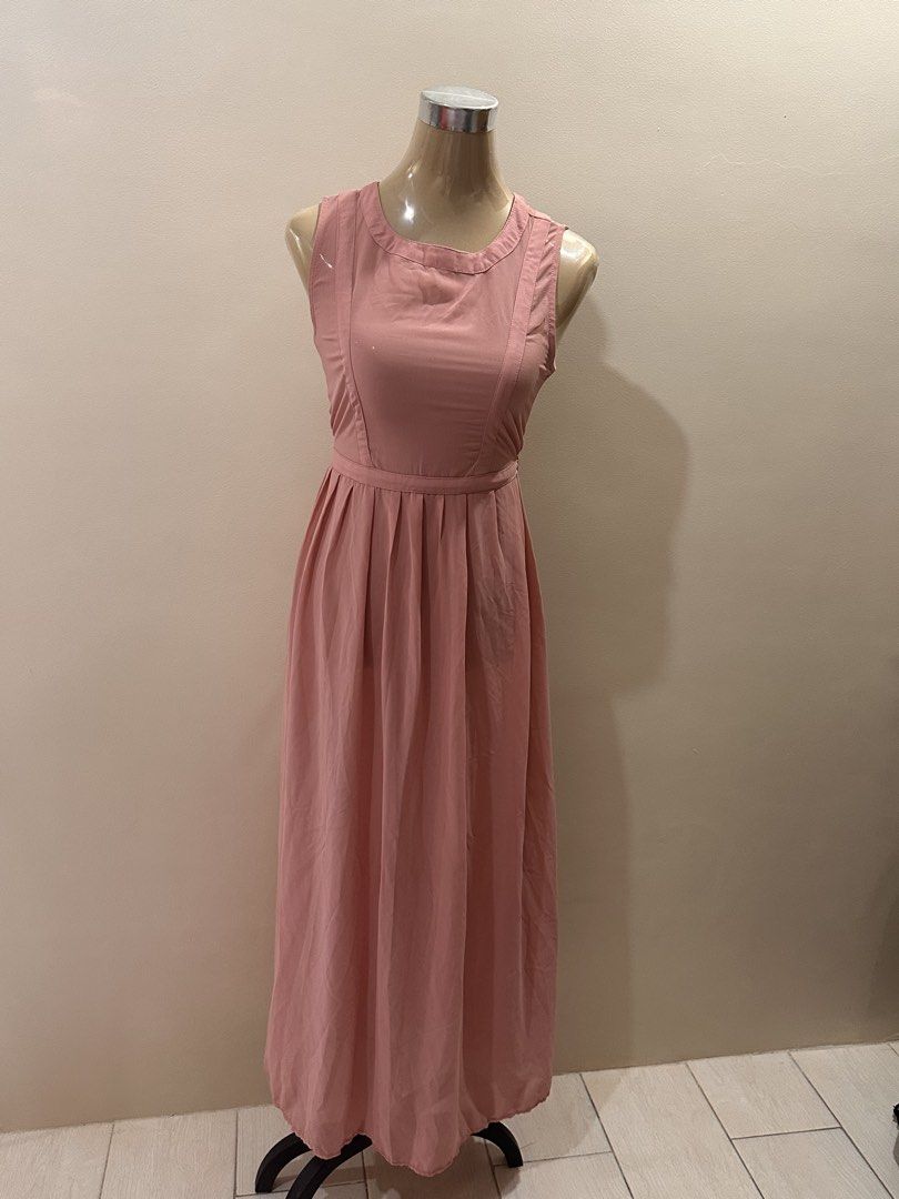 Pink Maxi Dress with Slip (Category: Dresses) located in San Fernando. Submitted by rpam21 (Listing ID 1424382205, Image 1). Description: - Pink maxi dress - Flattering silhouette - Fitted bodice - Flowing skirt - Includes matching slip dress - Adjustable tie-back waist - Perfect for special occasions.