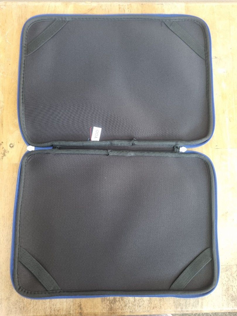 Plain blue laptop sleeve 15" with zipper (Category: Laptop Bags & Sleeves) located in Las Pinas. Submitted by homedispatch (Listing ID 1424404938, Image 2). Description: - Plain blue laptop sleeve - Features a secure zipper closure - Includes elastic straps inside to hold laptop - Simple design dimensions: 14.5" x 10.5".