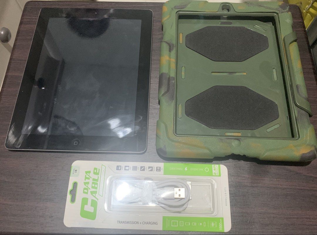 [PRELOVED] iPad 2 16 GB WiFi Model (Category: iPad) located in Manila. Submitted by dolphin_icecream (Listing ID 1424466507, Image 3). Description: iPad 2 16 GB WiFi Model in decent condition. Comes with a free case and data cable for charging. Message me for more details. Flaws: - Speakers have a static sound while playing actual audio - Small dents on the left edges (when viewed at vertical orientation) near the corners. - A black spot on the s