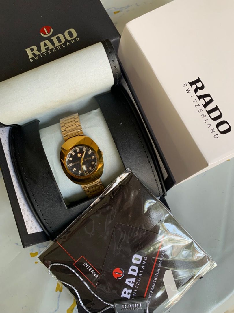 Rado Diastar Original Black (Category: Luxury Watches) located in Caloocan City. Submitted by hardaway.854 (Listing ID 1424381078, Image 1). Description: Details: Gold Strap Automatic Movement 35.5mm Case Diameter 6'0 Day Date Calendar Deployant Clasp Strap 9/10 Good condition, All working, with minimal signs of wear only Guaranteed authentic SRP / Mall Price:75,000-85,000 php Set with: Presentation box Original Card Transactions thru: Meet-up Pe