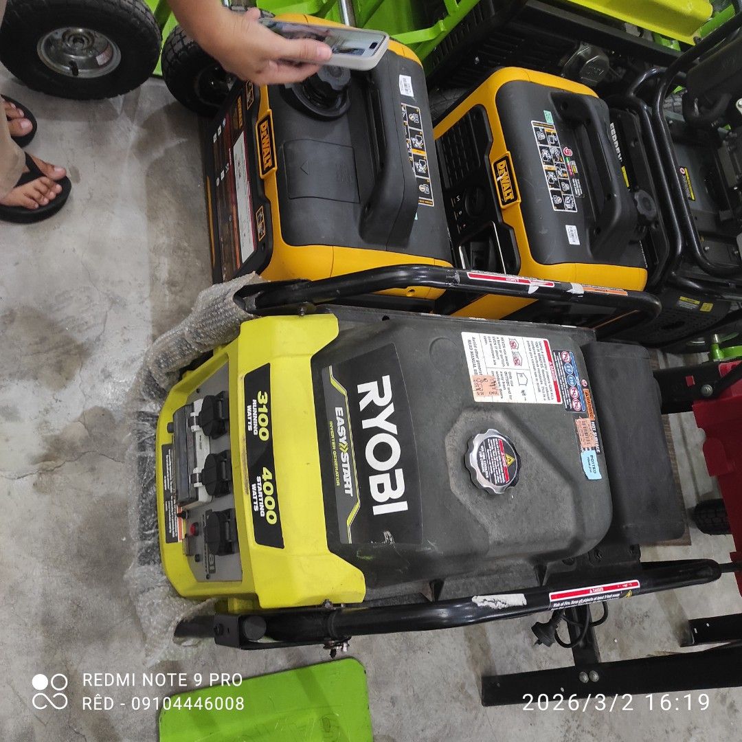 Ryobi 3100/4000 Watt Generator (Category: Construction Tools & Equipment) located in Manila. Submitted by red_finders (Listing ID 1424341778, Image 1). Description: Ryobi generator with Easy Start feature. It has a running wattage of 3100 and a starting wattage of 4000. The unit is black and yellow. It has multiple outlets for various devices. The image also shows a DeWalt generator..