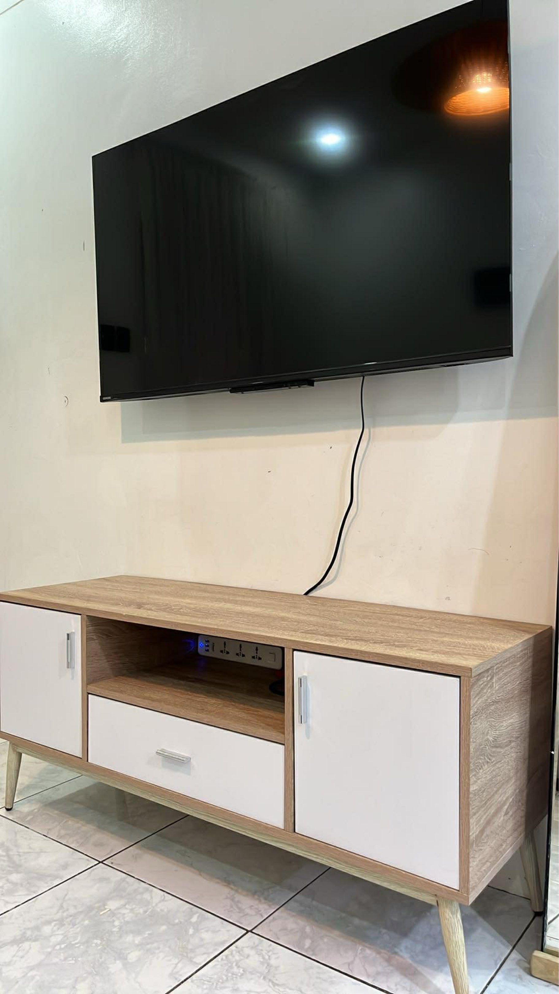 San-Yang aesthetic TV Console (Category: TV Consoles) located in Quezon City. Submitted by racollo (Listing ID 1424369410, Image 2). Description: Flaw : may minimal dog bite sa drawer handle but overall in good condition RFS : Moving to new house.