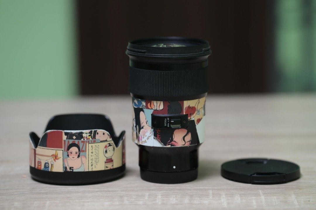 SIGMA ART 50MM 1.4 DG E-MOUNT (Category: Cameras) located in Makati City. Submitted by zygph (Listing ID 1424516902, Image 2). Description: - Sigma lens with unique custom skin. - Includes lens, lens hood, and lens cap. - Ready for immediate use. - Perfect for photographers..