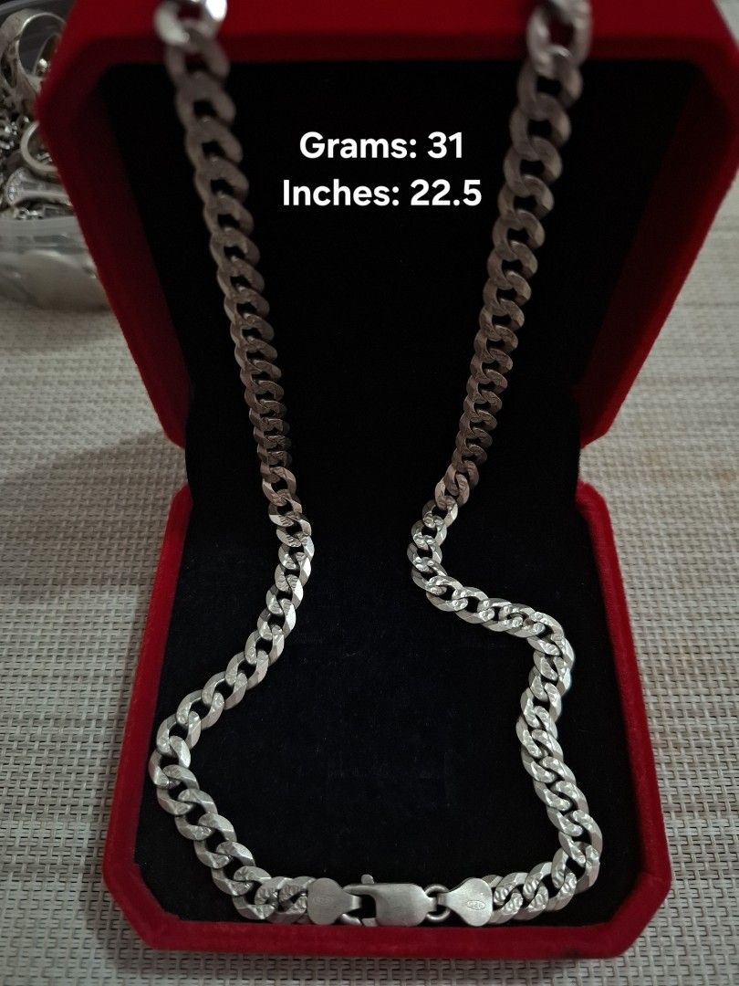 Silver 925 Necklace 22.5 Inches (Category: Jewelry) located in Makati City. Submitted by tweenz17 (Listing ID 1424382246, Image 1). Description: Silver chain necklace weighs 31 grams and is 22.5 inches long. It features a classic curb chain d. A timeless piece suitable for everyday wear or special occasions..