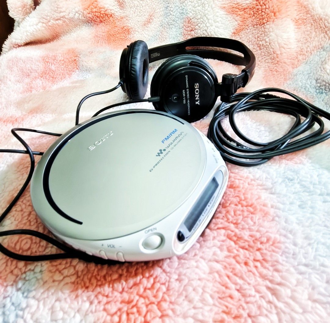 Sony Walkman (Category: Portable Music Players) located in Pateros City. Submitted by randomsheesh (Listing ID 1424382273, Image 1). Description: BASA‼️ RARE Sony Walkman D-FJ211 Portable CD Player with AM/FM Radio - Excellent Condition. with Sony headphones 🎧 MDR-V150 Up for sale is a classic piece of Sony engineering: the Sony Walkman D-FJ211. This isn't just a standard Discman; it features a built-in digital AM/FM tuner, making it the perfect