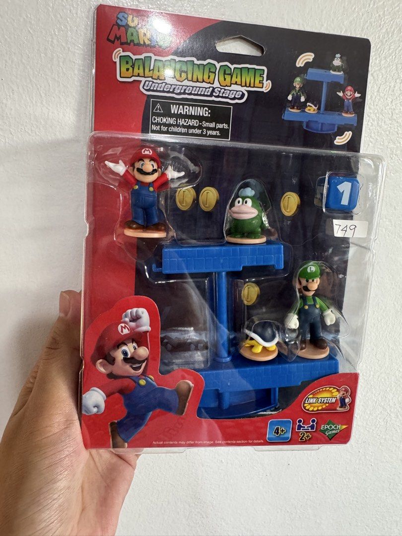 Super Mario Balancing Game Underground Stage (Category: Nintendo) located in Santa Ana. Submitted by tokiotokio (Listing ID 1424438616, Image 1). Description: - Super Mario Balancing Game: Underground Stage edition! - Includes Mario, Luigi, and other iconic characters. - Made by Epoch - Package includes a die and coins. - Warning: Choking hazard. Not suitable for children under 3 years old..