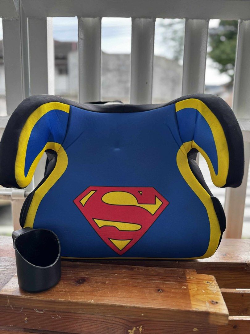 Superman Backless Booster Car Seat (Category: Car Seats) located in Cainta. Submitted by phoy8910 (Listing ID 1424357670, Image 2). Description: - Superman backless booster car seat - Vibrant blue design with Superman logo - Features black and yellow accents - Includes a built-in cup holder - Backless design for easy installation - Comfortable and safe for your child.