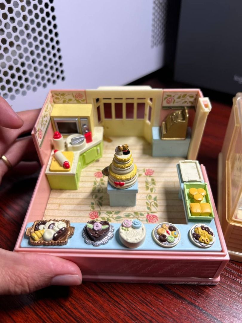 Takara Miniature Cake Shop Playset (Category: Kids Toys) located in Baguio. Submitted by ditoyzb08176 (Listing ID 1424472840, Image 2). Description: Adorable Takara miniature cake shop playset. Features a detailed interior with a display case, kitchen, and various miniature cakes and pastries. The set includes a cash register, oven, and other accessories. The playset is in a compact, foldable design for easy storage and display. Made in China. Lo